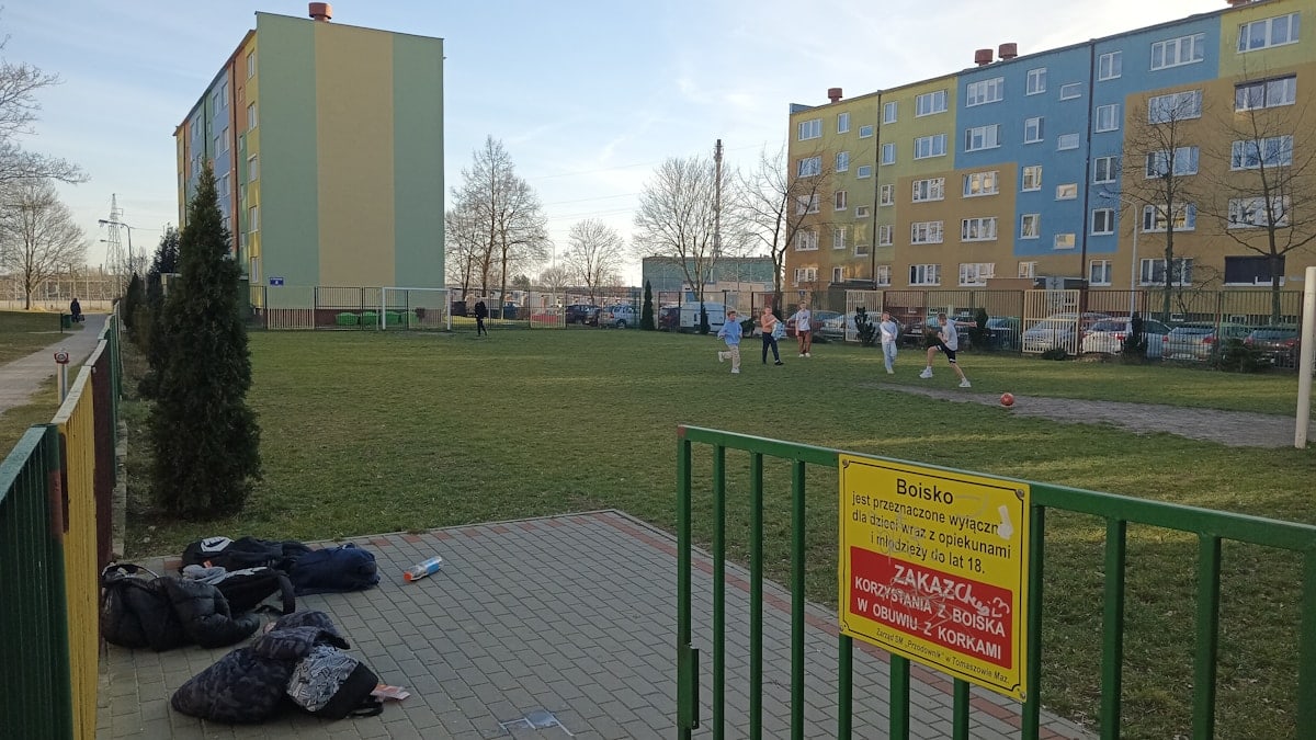 a group of people playing a game of soccer